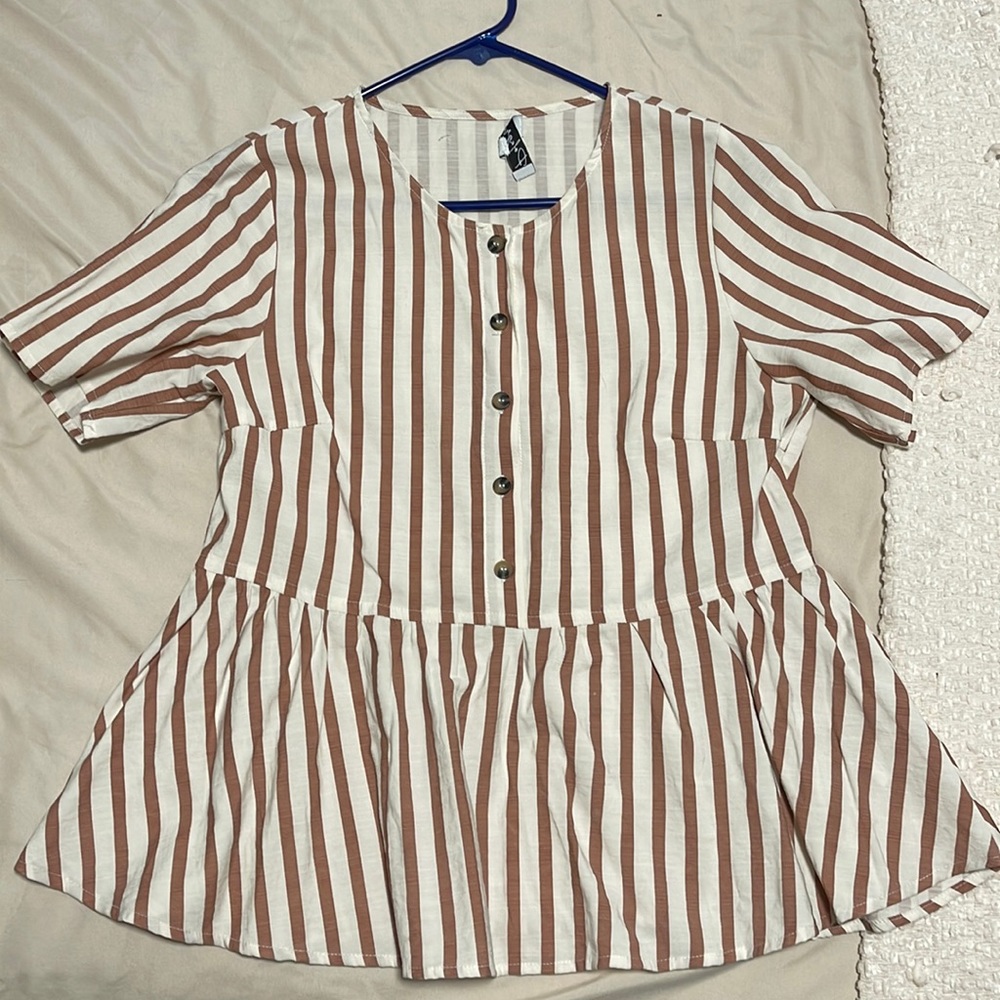 Cute medium shirt! Like new, barely worn :)